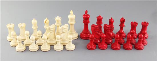 An early 20th century Staunton pattern carved and stained ivory chess set, kings 4in.